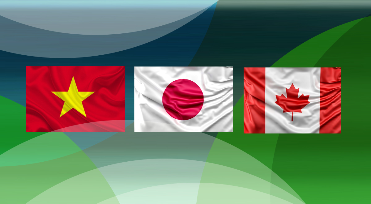 Na zdjęciu widoczne są trzy flagi: Japonii, Wietnamu i Kanady